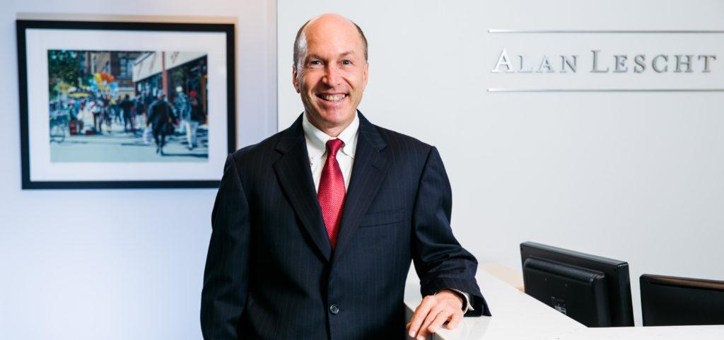 Picture of Alan Lescht standing in an office